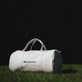 White custom barrel sports duffel bag with RG Sports logo and carry handles
