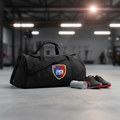 Black custom sports duffel bag with RG Sports Australia crest in a gym